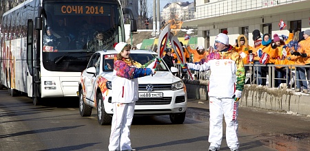 Torch with the Olympic flame in our hands!